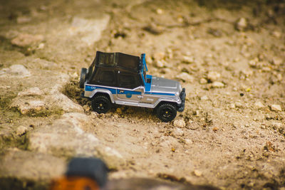 High angle view of toy car on field
