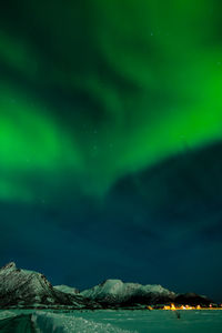 Scenic view of sea against sky at night