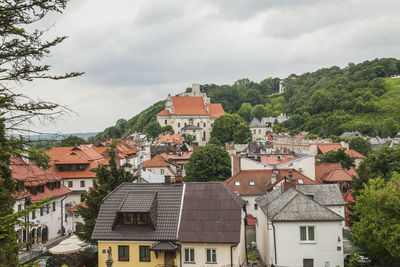 High angle view of residential buildings against sky