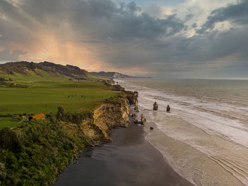 Scenic view of sea against sky during sunset