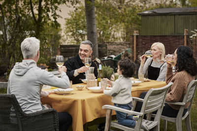 Family having meal in garden