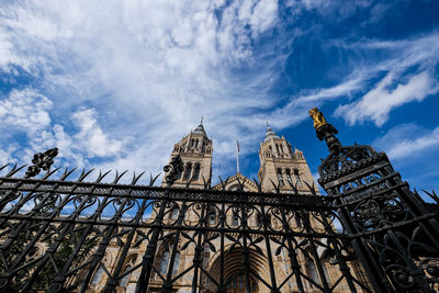 Low angle view of cathedral against cloudy sky