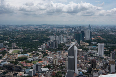 High angle view of cityscape seen from menara kuala lumpur tower