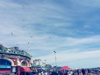 View of buildings against cloudy sky