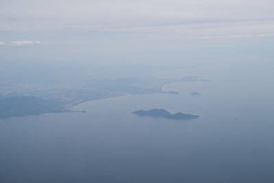 Aerial view of mountains against sky