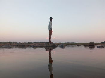 Woman standing in lake