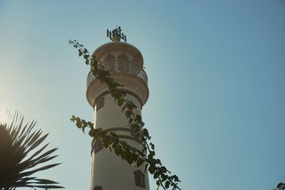 Low angle view of building against clear blue sky