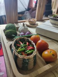 Close-up of fruits in basket on table