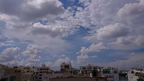 Low angle view of cityscape against sky