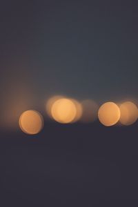 Defocused image of illuminated lights at night