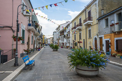 The beautiful main street of san vito chietino with colored flowers and facades