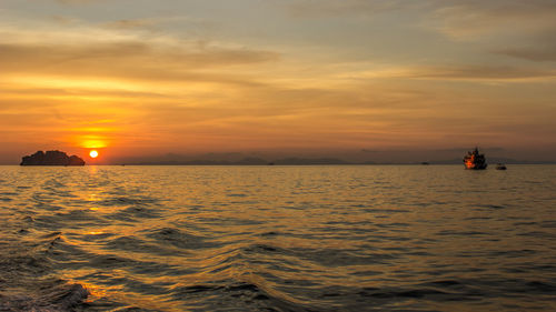 Scenic view of sea against sky during sunset