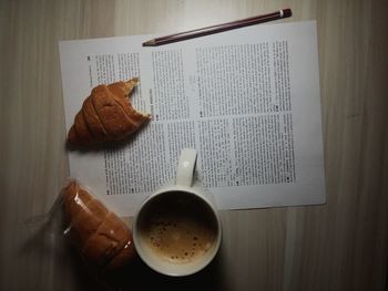 Close-up of coffee cup on table