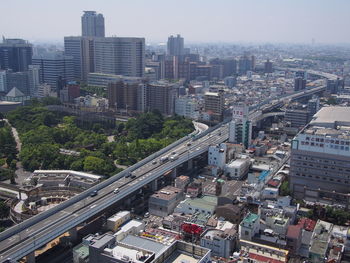 Aerial view of cityscape against sky