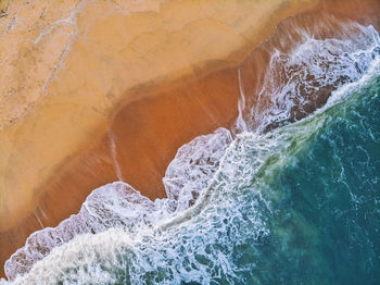 Water splashing on rock