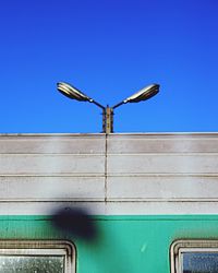 Low angle view of building against blue sky