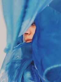 Close-up of baby sleeping on bed