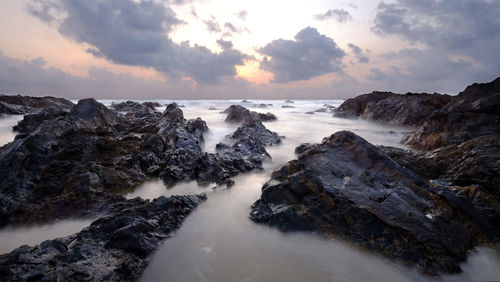 Scenic view of sea against sky during sunset