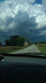 Road seen through car windshield