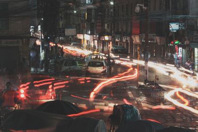 Traffic on city street at night