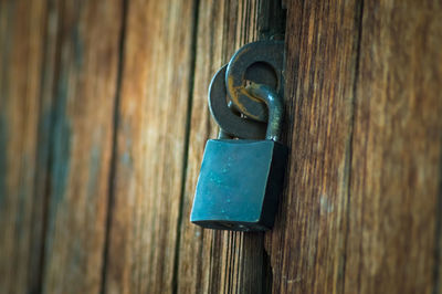 Close-up of padlock on door