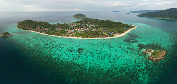 High angle view of sea shore against sky