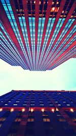 Low angle view of building against blue sky