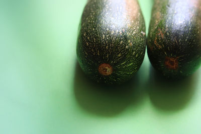 Close-up of fruit against white background