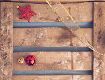 High angle view of autumn leaves on wood