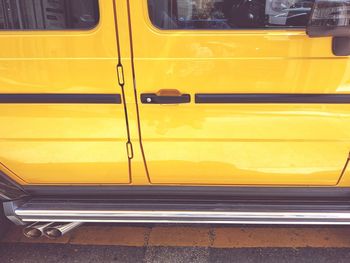 Yellow train in city