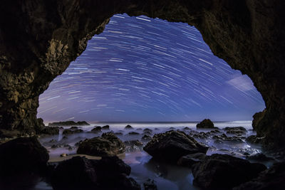 Scenic view of sea against sky at night