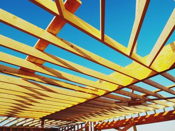 Low angle view of built structure against blue sky