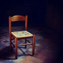 High angle view of chair on table