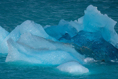 High angle view of water splashing in sea