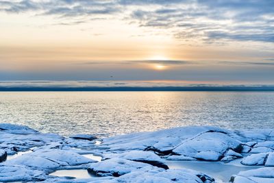 Scenic view of sea against sky during sunset