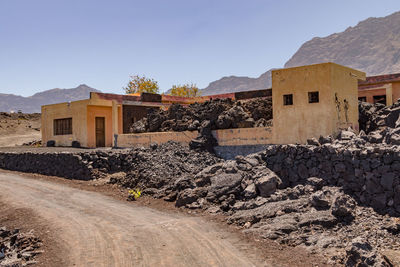 Houses destroyed by lava in the crater of volcano pico do fogo, cape verde islands, atlantic ocean