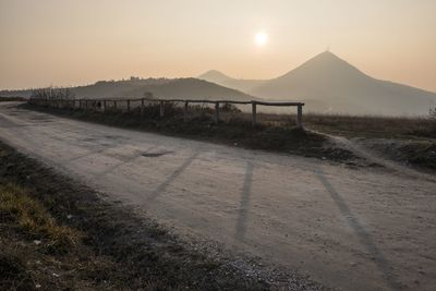 Scenic view of landscape against sky during sunset