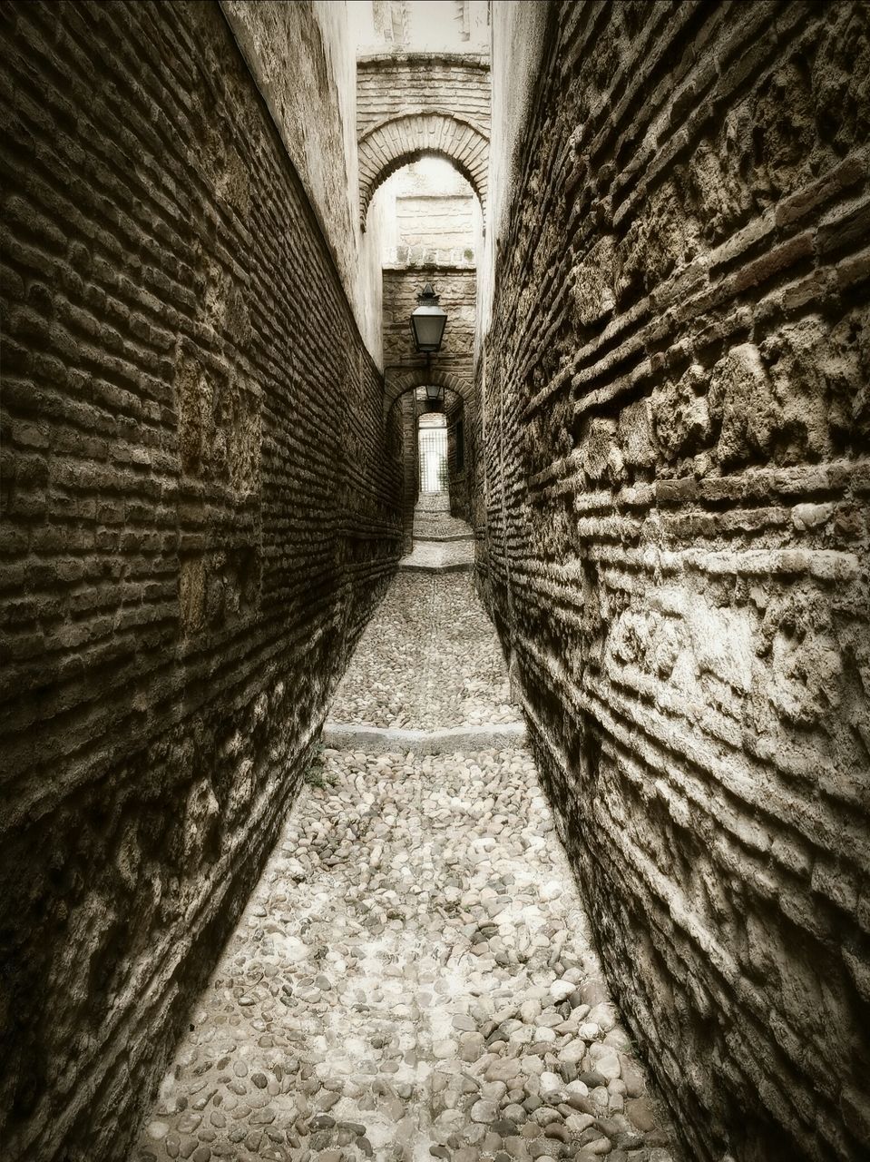 architecture, built structure, the way forward, arch, diminishing perspective, indoors, old, stone wall, vanishing point, wall - building feature, history, brick wall, tunnel, narrow, wall, building exterior, day, building, archway, ancient