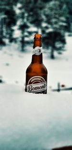 Close-up of beer glass bottle