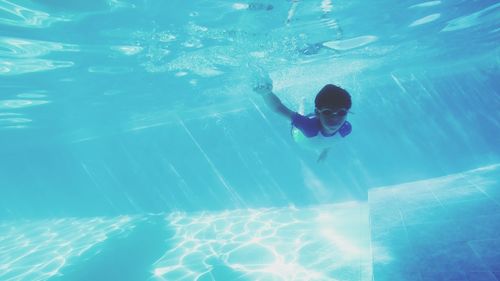 Woman swimming in pool