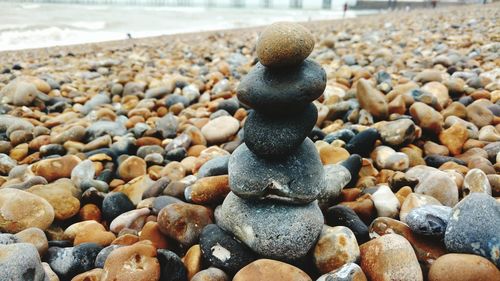 Close-up of pebbles on shore