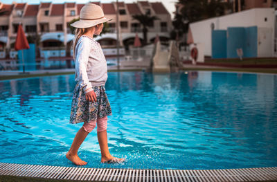 Full length of senior man in swimming pool