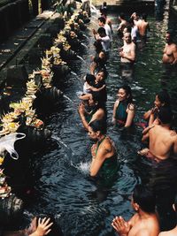 High angle view of people in river