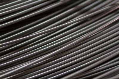 Stainless steel wire in production workshop or construction site. metal texture.