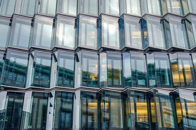 Irregularly shaped glass facade of an office building in mitte district