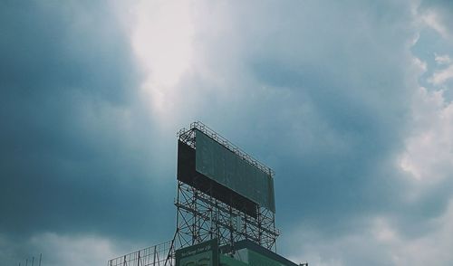 Low angle view of built structure against cloudy sky