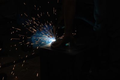 Low angle view of firework display in factory