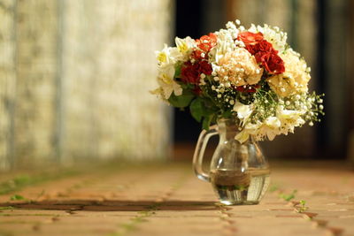 Close-up of flower vase on table