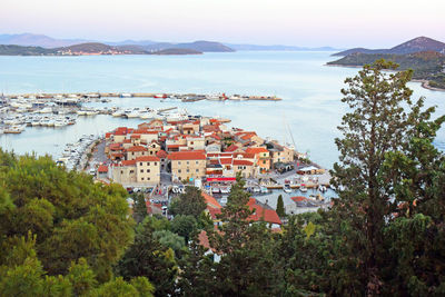 High angle view of townscape by sea