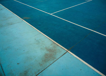 Image of a tennis court with blue colors
